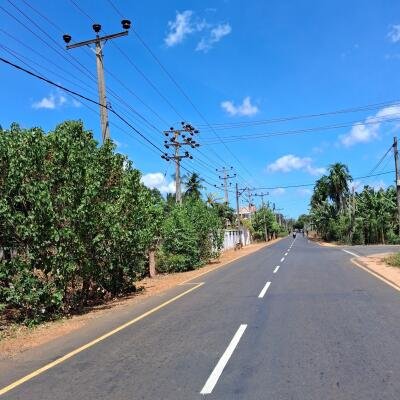Puthur Achuveli till the moon Main street front with house-4